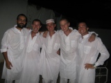 5 men in white clothes